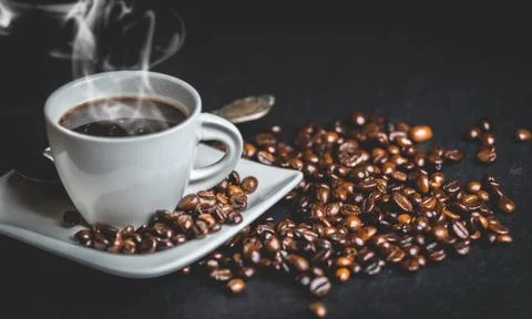 Cup of coffee with smoke Stock Photos