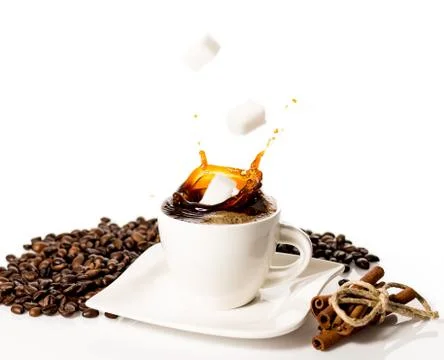 Cup of coffee splash Stock Photos