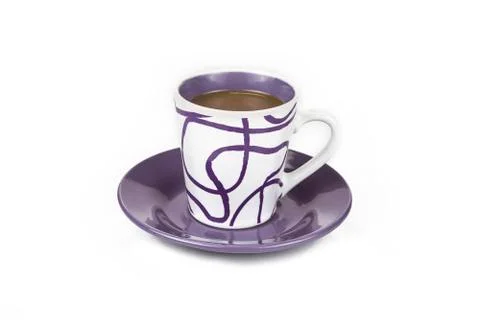 Cup of coffee with the spoon on white background Stock Photos