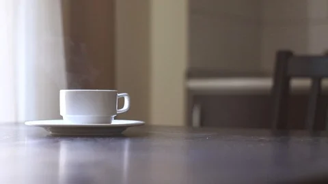 Cup of coffee with steam Stock Footage 101019557