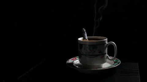 Cup of coffee with steam Stock Photos