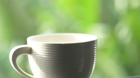 Cup of coffee with steam in slow motion Stock-Footage 134916033