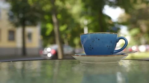 A cup of coffee in a summer cafe Stock Footage 229333471