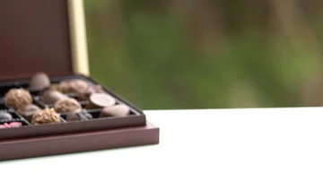 Cup of coffee with Sweets or Candy  Chocolates Box Vidéo 85957165