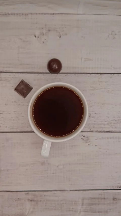 Cup of coffee with sweets table setting Stock Footage 329939116