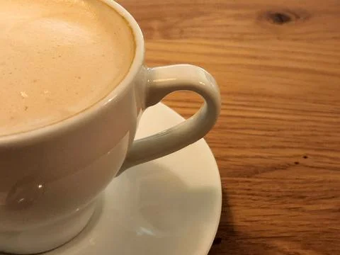 Cup of coffee on the table. Brewed coffee in a cup Stock Photos