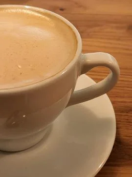 Cup of coffee on the table. Brewed coffee in a cup Stock Photos