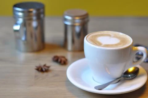 Cup of coffee on table in cafe Foto stock