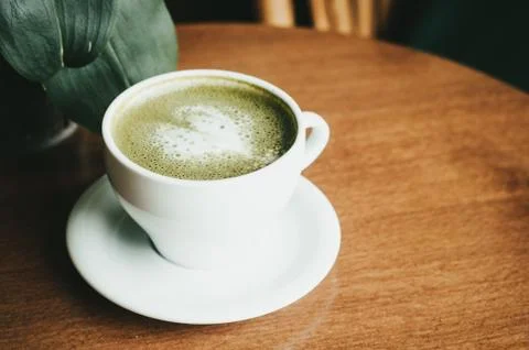 Cup of coffee on table in cafe Foto stock