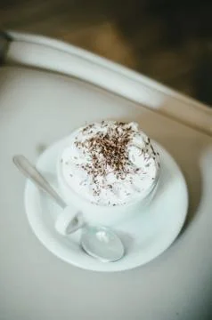 Cup of coffee on table in cafe Stock Photos