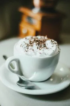 Cup of coffee on table in cafe Foto stock