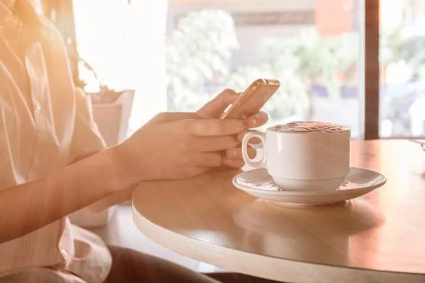 Cup of coffee on the table in coffee shop Foto stock
