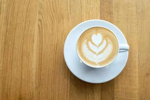 Cup with coffee on the table. Concept and idea for resting time Stock Photos