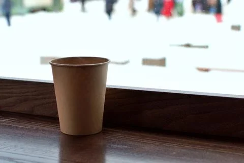 Cup with coffee on table inside a cafe Stock Photos