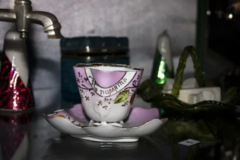 A cup of coffee on a table in the kitchen. Selective focus. Stock Photos