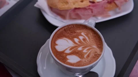 A cup of coffee on the table outside, morning breakfast in the restaurant Stock Footage 308809322