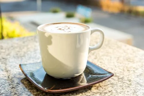 Cup of coffee on table Stock Photos