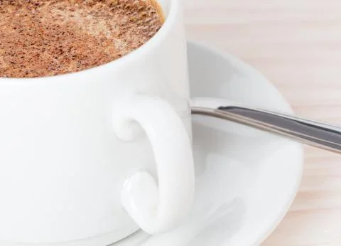 A cup of coffee on the table Stock Photos