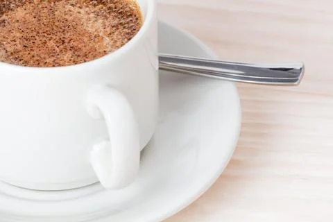 A cup of coffee on the table Stock Photos