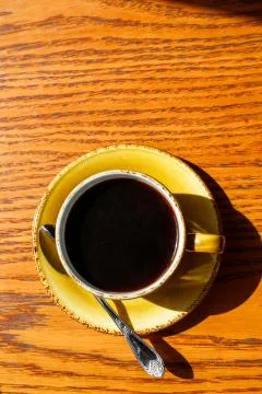 A cup of coffee on the table Stock Photos