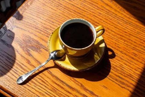 A cup of coffee on the table Stock Photos