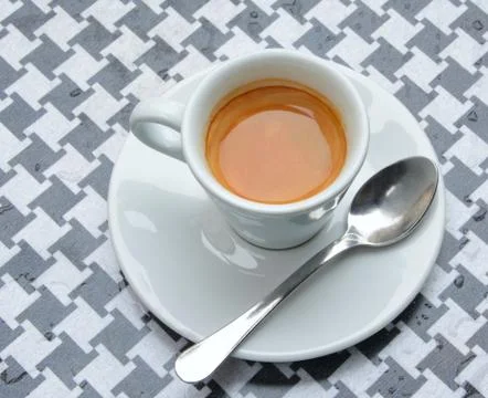 Cup of coffee on a table Stock Photos