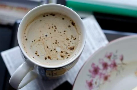 Cup of coffee on the table Stock Photos