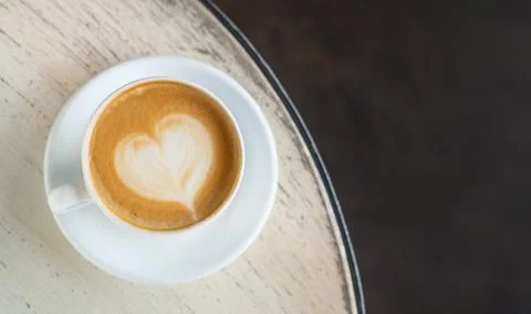 Cup with coffee on the table Stock Photos