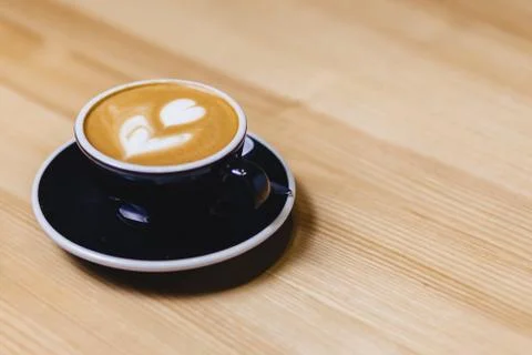 Cup of coffee on table Stock Photos