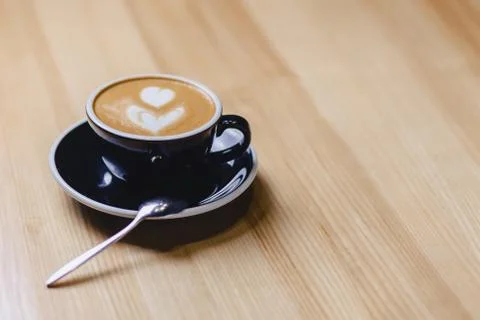 Cup of coffee on table Stock Photos