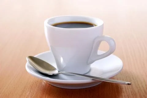 Cup of coffee on the table Stock Photos