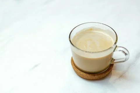 A cup of coffee on a table Stock Photos