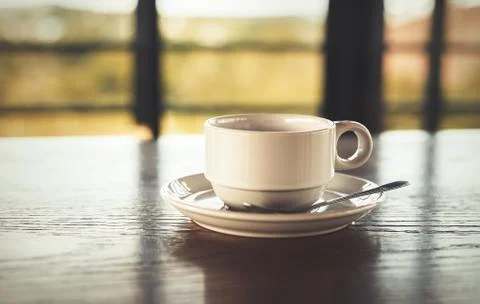 A cup of coffee on the table. Stock Photos