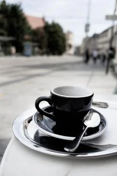 A cup of coffee on a table Stock Photos