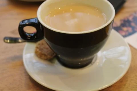 Cup of coffee on table Stock Photos