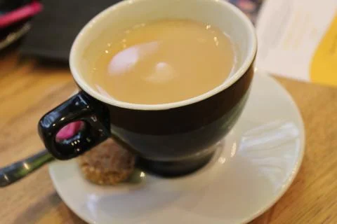 Cup of coffee on table Stock Photos
