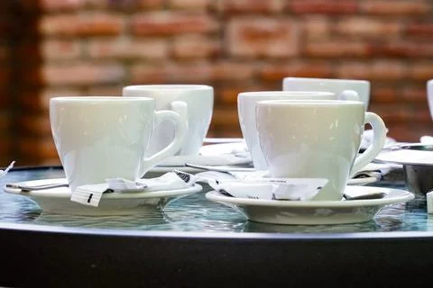 Cup of coffee on table Stock Photos