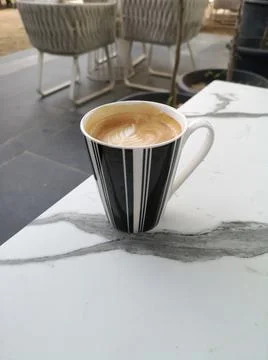 A cup of coffee on the table Foto stock