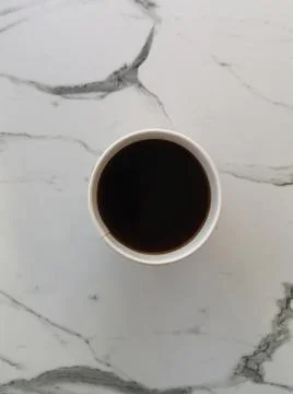 A cup of coffee on the table Stock Photos