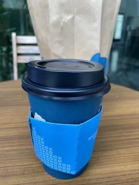 Cup of coffee on the table Stock Photos