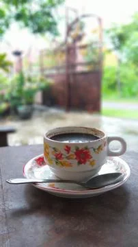 A cup of coffee on the table Stock Photos