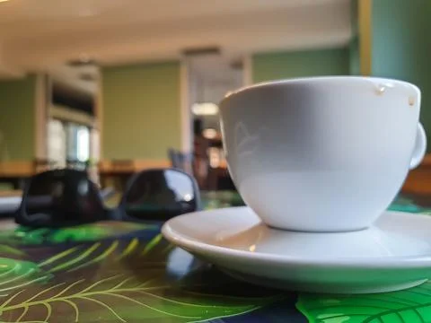 Cup with coffee on the table Stock Photos