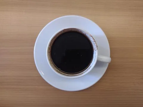 Cup of coffee on the table Stock Photos
