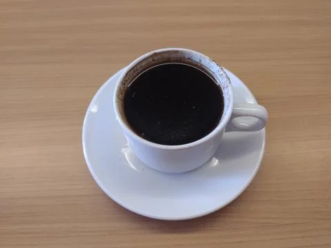 Cup of coffee on the table Stock Photos
