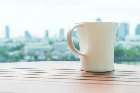 Cup of coffee on table Stock Photos