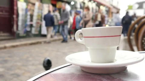Cup of Coffee on a Table of Street Cafe on Montmartre, Paris - october 2021 Stock Footage 164593365