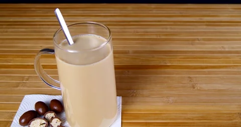 A cup of coffee on the table with sweets and pastries Stock Footage 143669230