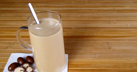 A cup of coffee on the table with sweets and pastries Stock Footage 143669234