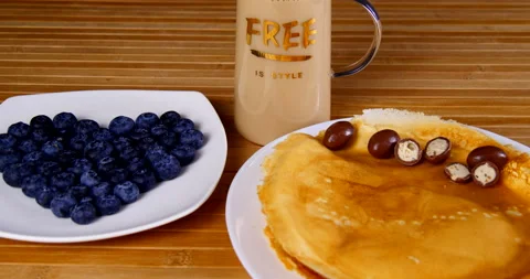 A cup of coffee on the table with sweets and pastries Stock Footage 143669558