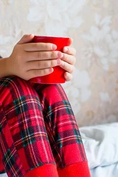 Cup of coffee tea cocoa in the hands of a girl Stock Photos